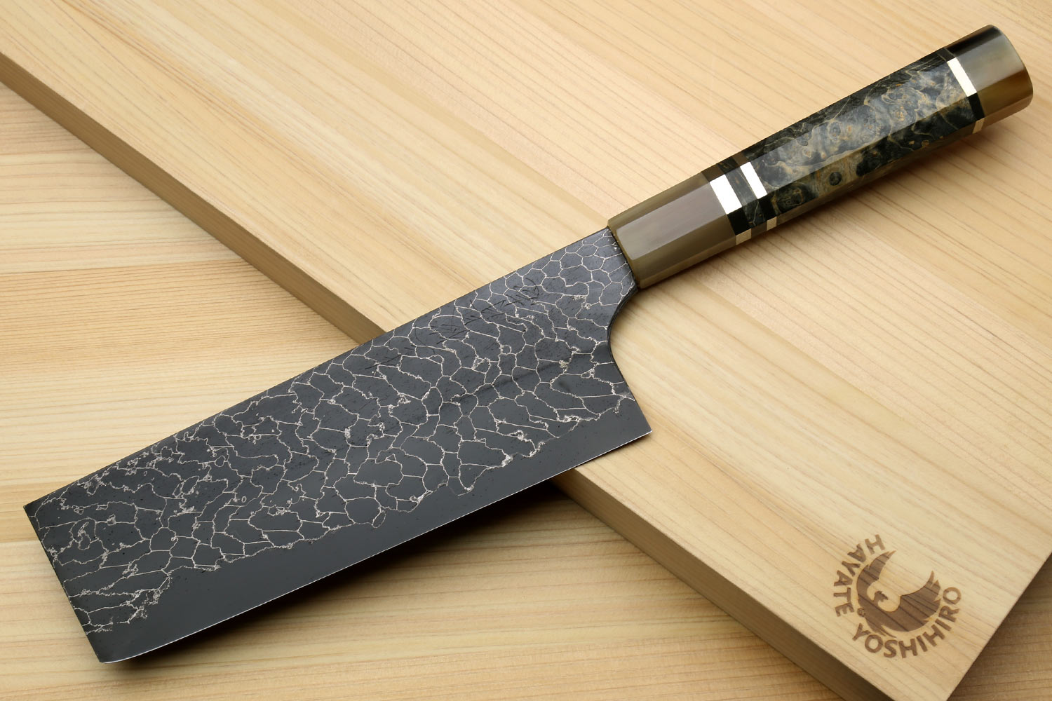Nakiri vegetable knife with dark blade and white crackle Damascus pattern
