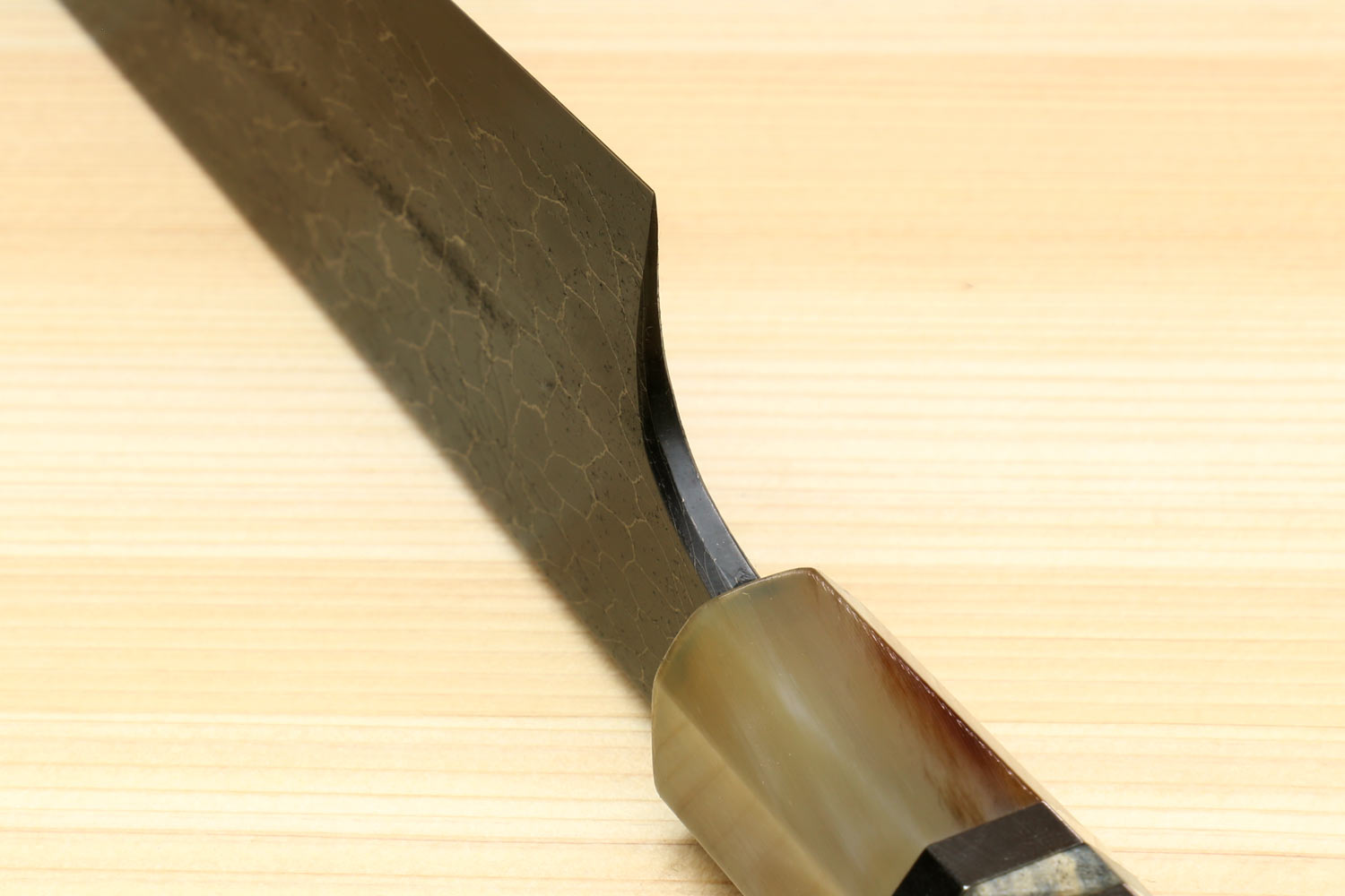 Sujihiki slicer knife handle and bolster with black Damascus patterned blade