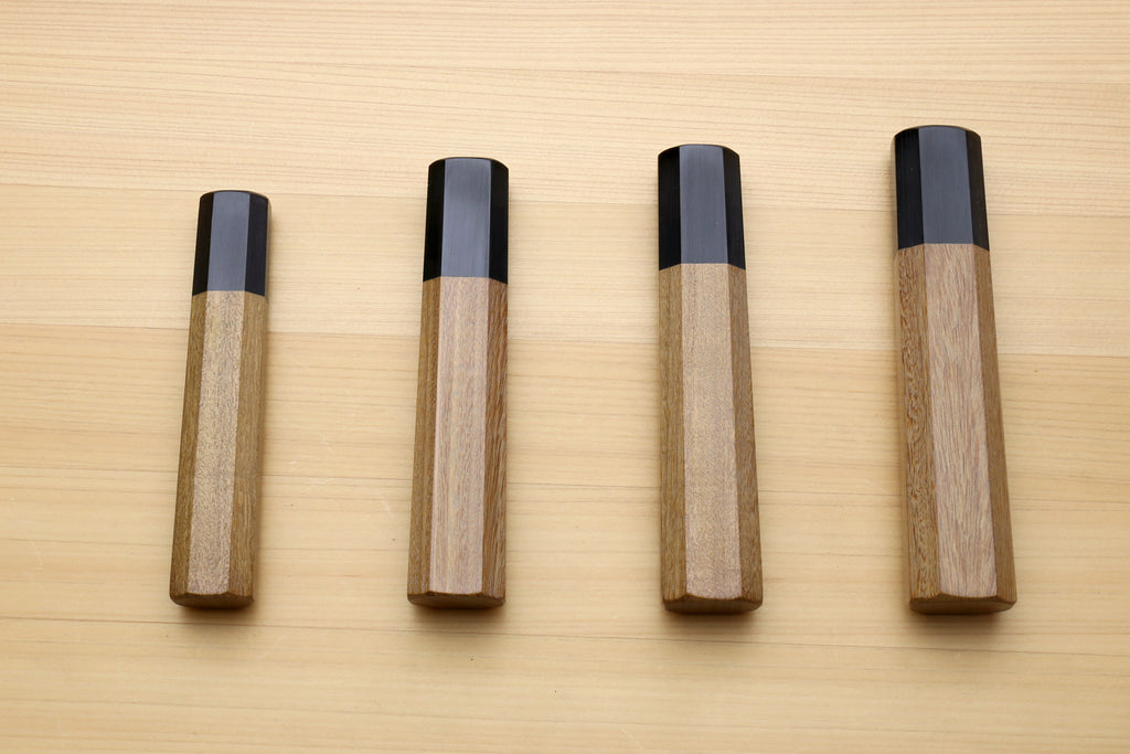 Gyuto chef knife handles with ebony bolsters and ambrosia wood grips, four angles