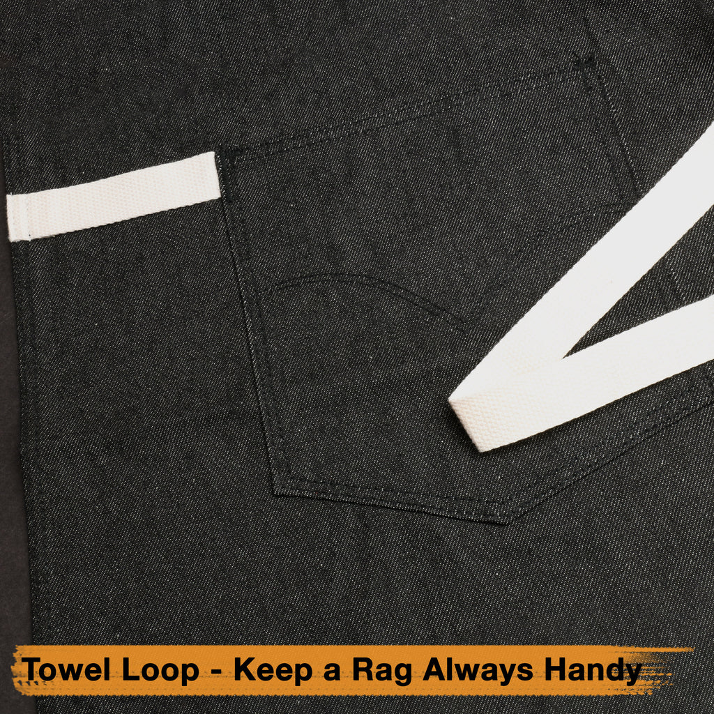 Dark denim kitchen apron with chest pocket and stitched towel loop