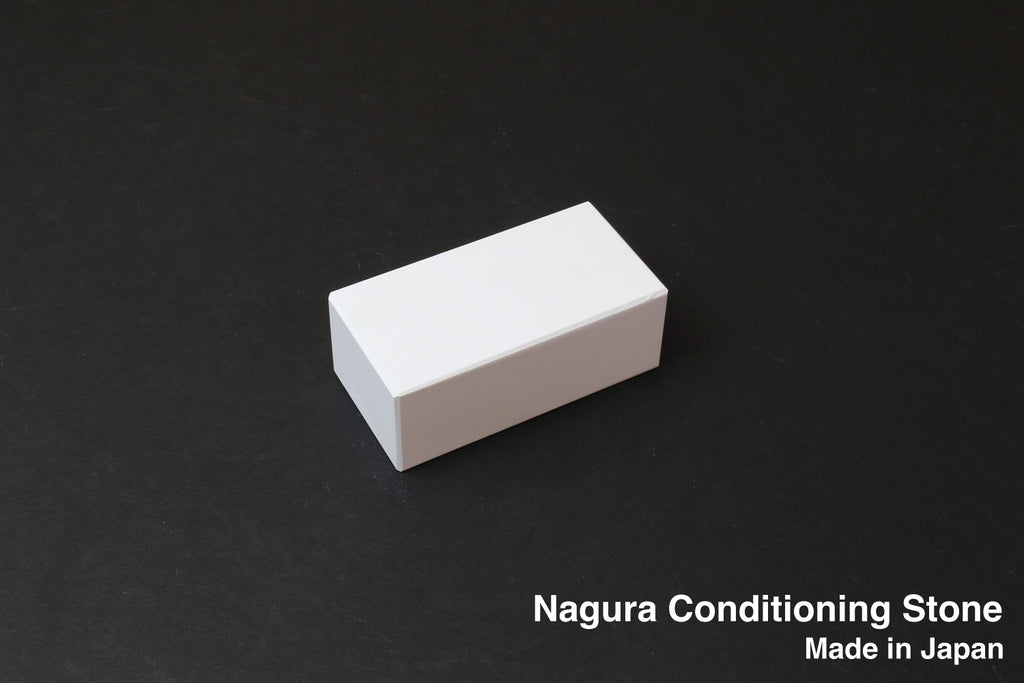 Nagura conditioning stone, small white rectangular block