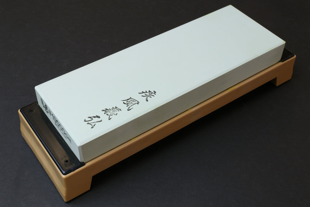 10,000-grit sharpening whetstone on base, pale green rectangular stone