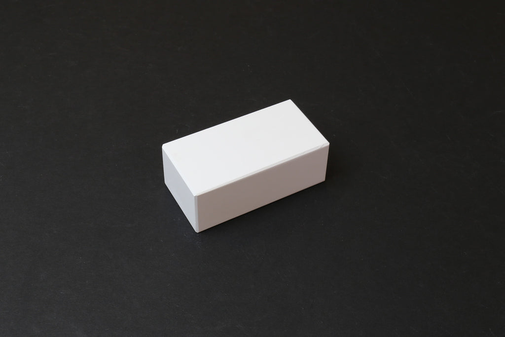Rectangular white conditioning stone block with smooth edges
