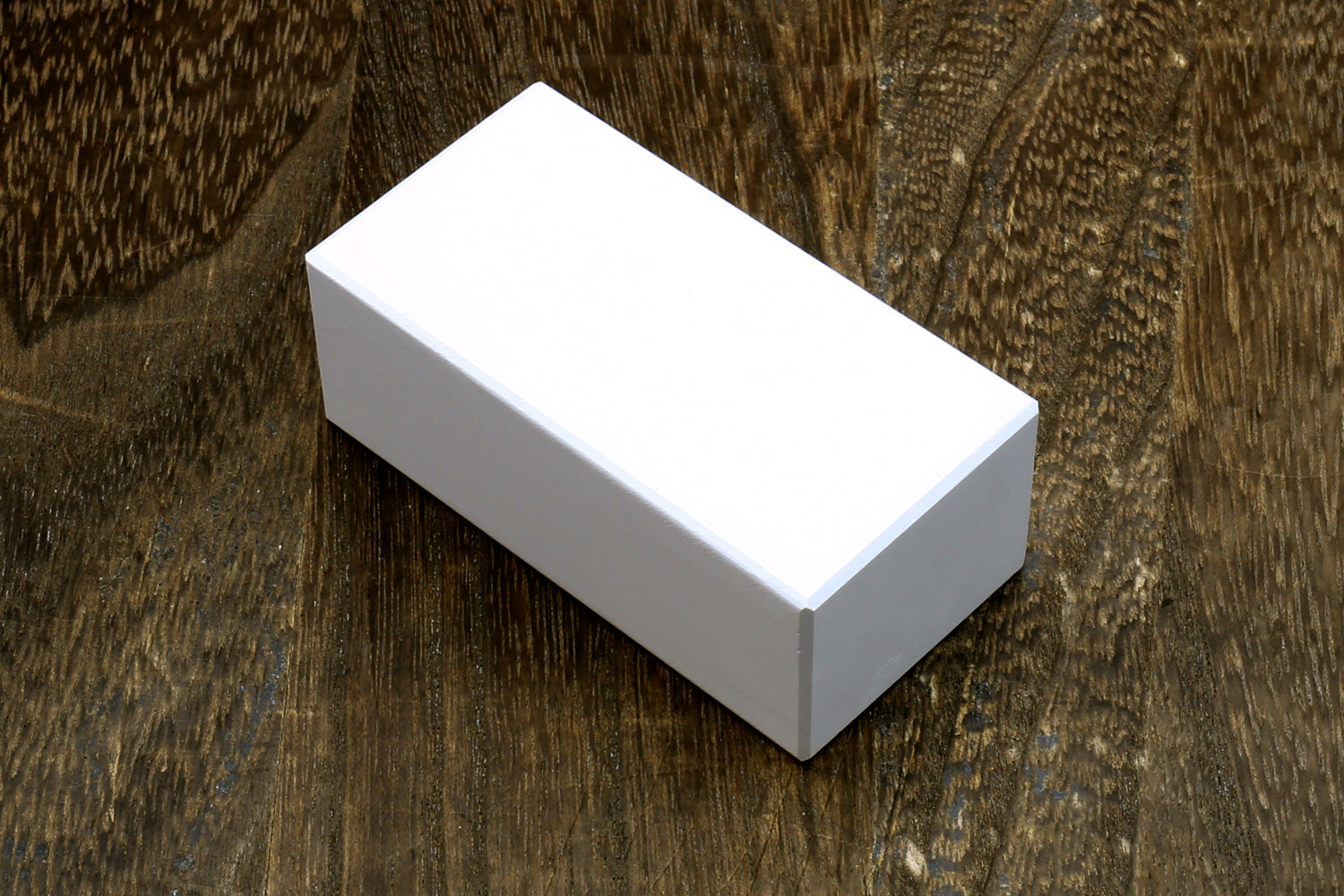 Rectangular conditioning stone block, white top and gray base
