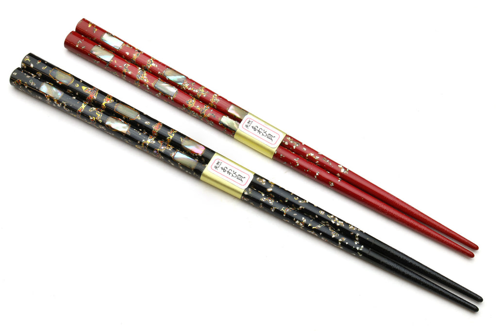 Pair of Japanese chopsticks, red and black with gold speckled shell pattern
