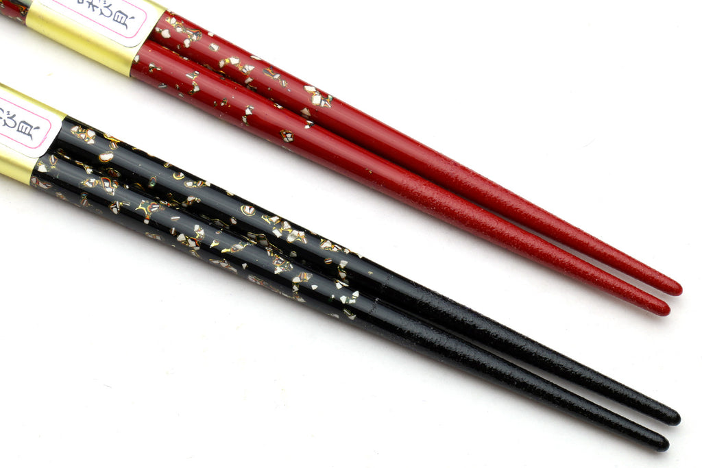 Japanese chopsticks with gold-speckled red and black finish, tapered tips