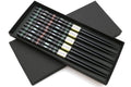 Black chopsticks set of 5 in open box, with green and red mosaic pattern