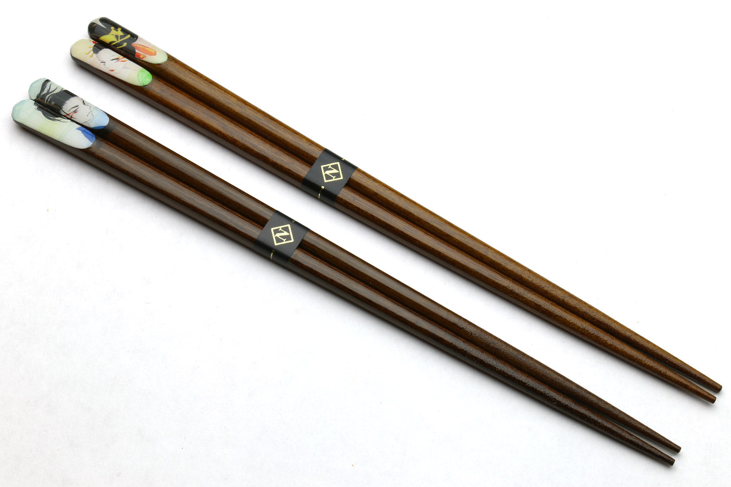 Wood chopsticks with colorful anime-style decals and black grip bands