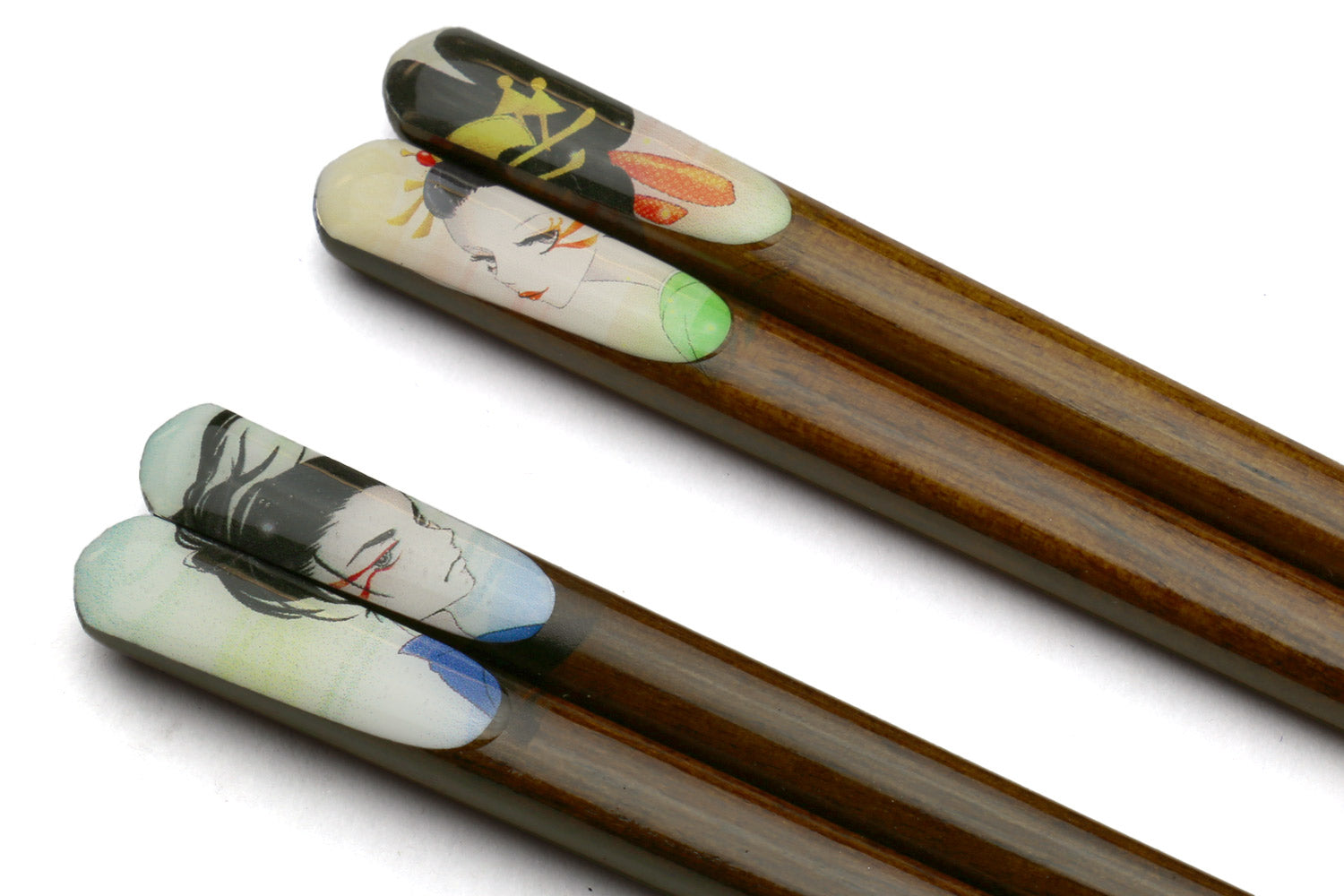 Lacquered wood chopsticks with character decals on light pads, twin pair