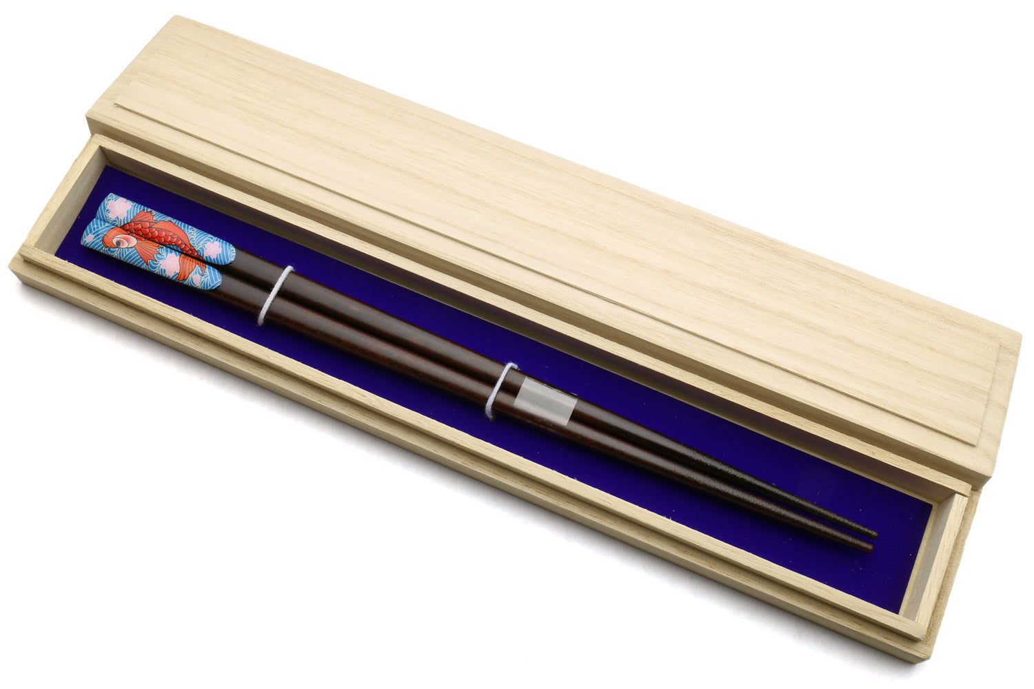 Chopstick set in pale wood box with blue liner, koi fish patterned pair