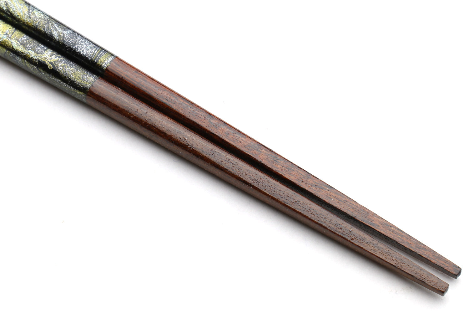 Pair of lacquered wooden chopsticks, dark marble pattern, shown at the tips
