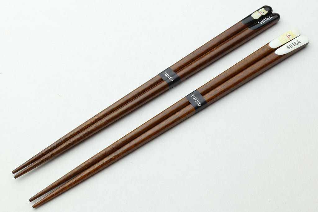 Brown lacquer wooden chopsticks, twin pair with end labels