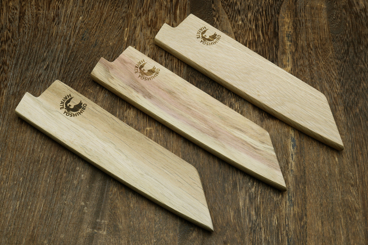 Light oak wooden saya blade protectors set with Yoshihiro logos for petty knives