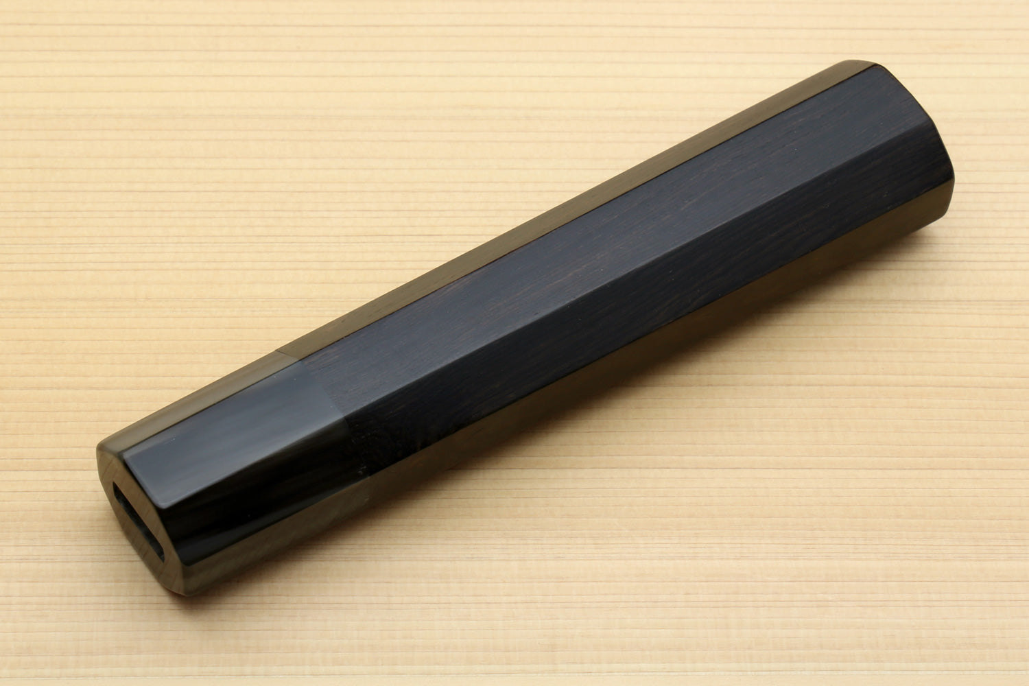 Ebony knife handle with horn bolster, long rectangular profile