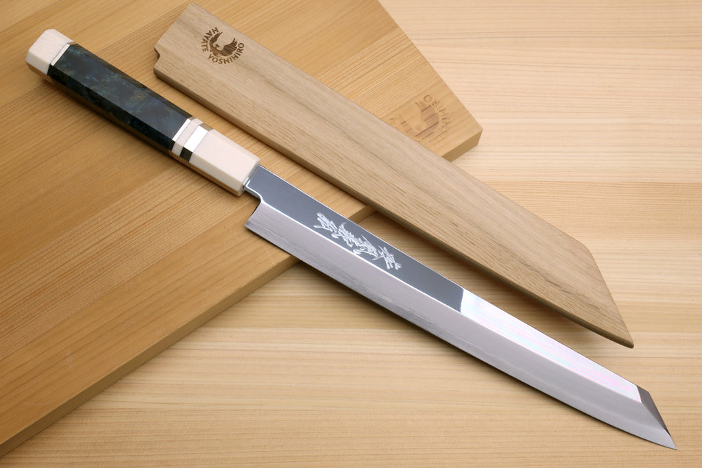 Japanese yanagi knife with stainless blade and dark handle with ivory bolster
