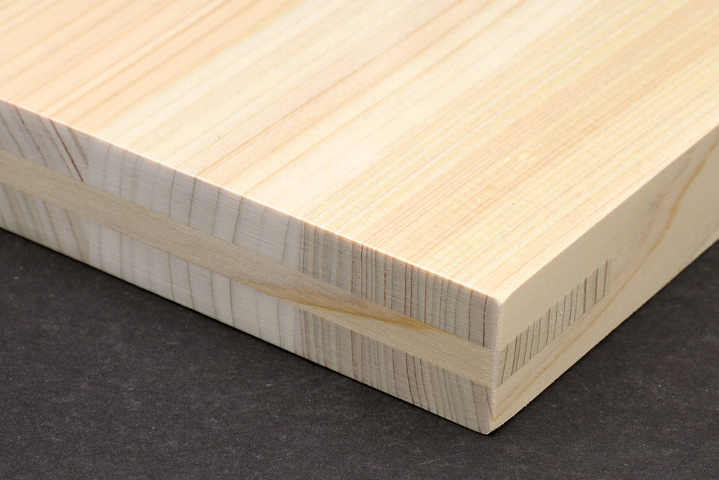 Japanese cypress cutting board with end-grain border and Yoshihiro logo