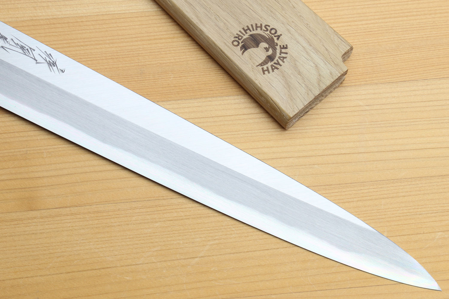 Sashimi knife blade, polished silver steel with a long, pointed cutting edge