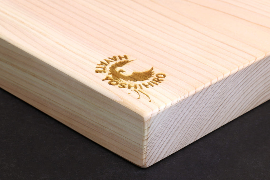 Hinoki cypress cutting board corner detail with engraved gold Yoshihiro Hinoki logo