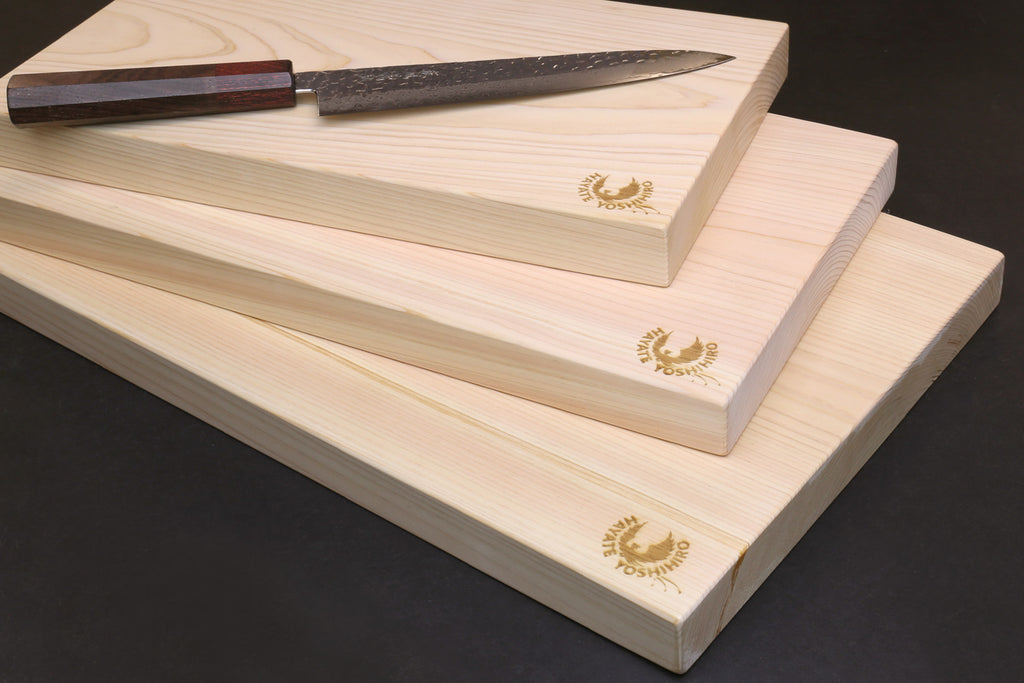 Hinoki cypress cutting board with knife, stacked one-piece planks and gold logos