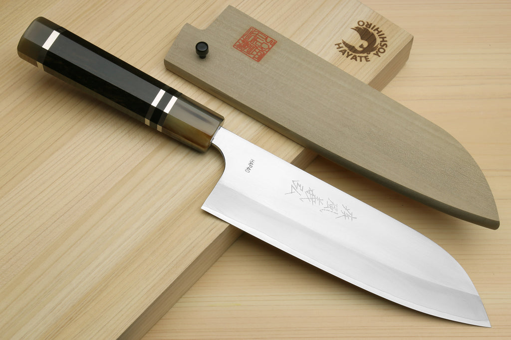 3-piece Japanese knife set with dark octagonal handles, engraved blades, and wooden saya