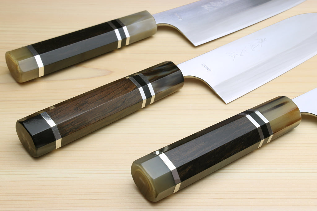 3-piece knife set with dark octagonal wood handles and triple-ring accents