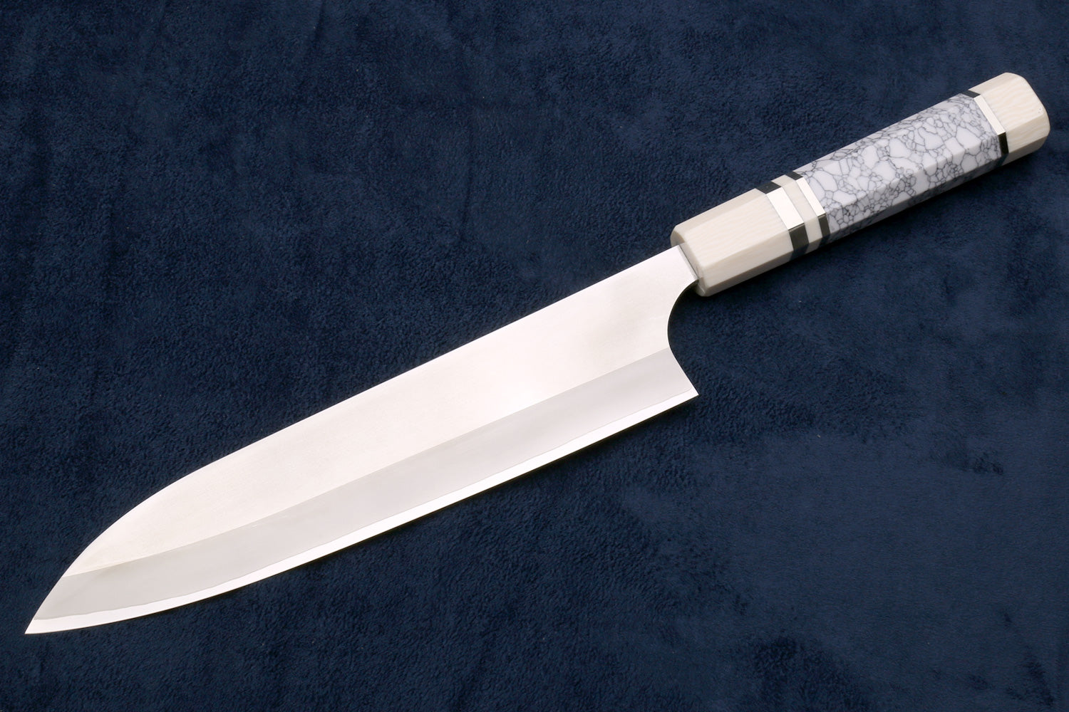 Chef's gyuto chef knife with pale steel blade and ivory-pattern handle bolster, 8.25 in.