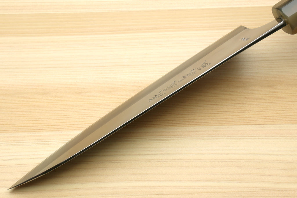 Gyuto chef's knife with polished steel blade and etched logo