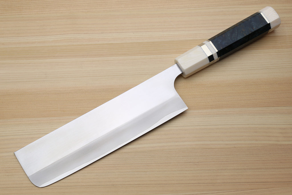 Nakiri vegetable chef knife with silver blade and dark blue handle grips