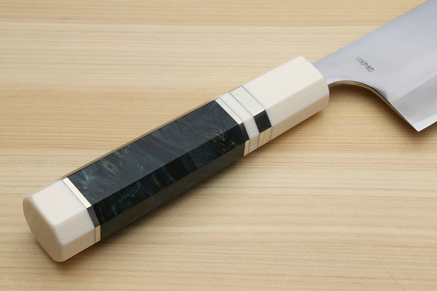 Nakiri vegetable chef knife with ocean-blue patterned handle and ivory bolster