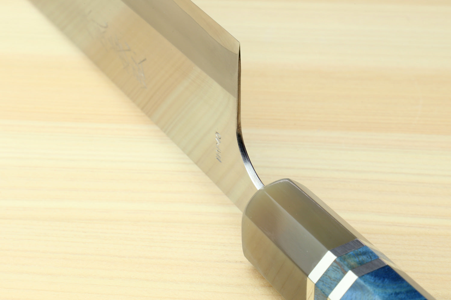 Nakiri knife edge and heel, with ocean blue patterned handle in saya