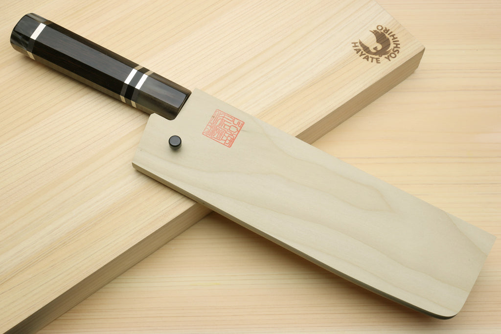 Nakiri vegetable chef knife with dark octagonal handle and straight edge blade
