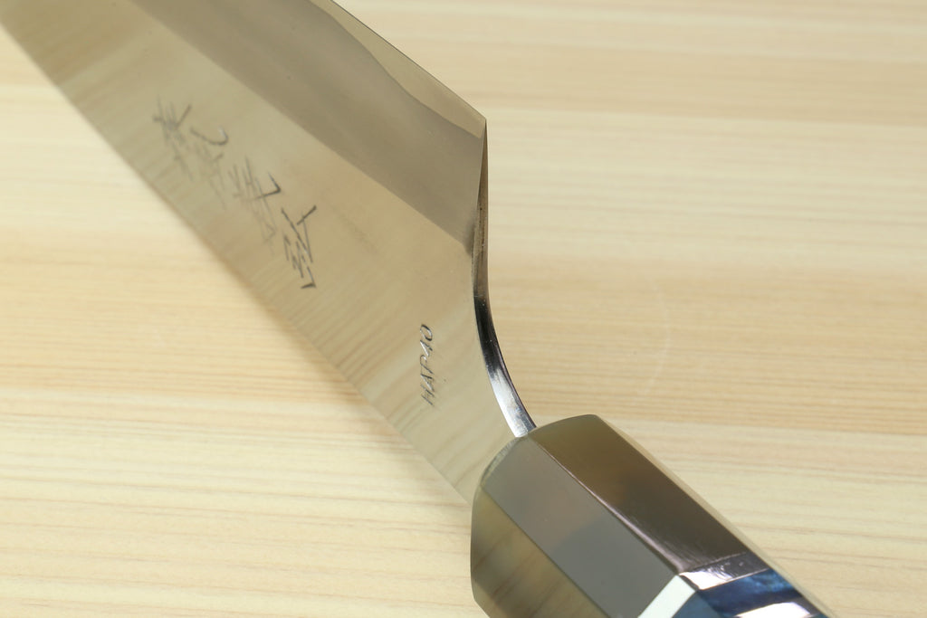 HAP40 petty chef knife blade and ocean blue handle with metal bolster, angled view