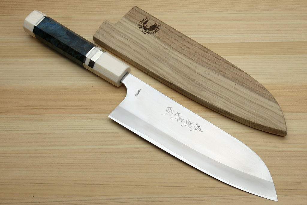 Santoku chef's knife with wooden saya and silver blade with etched text