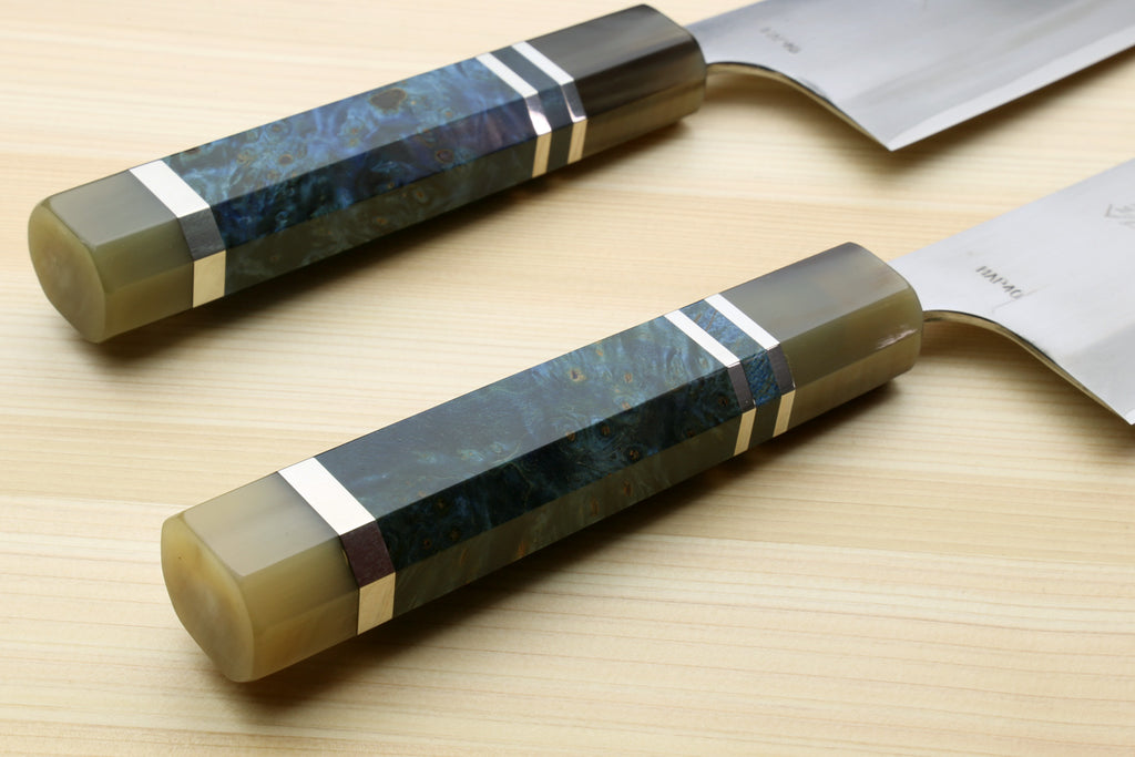 Santoku chef's knife with two blue ocean-pattern handles and white blades