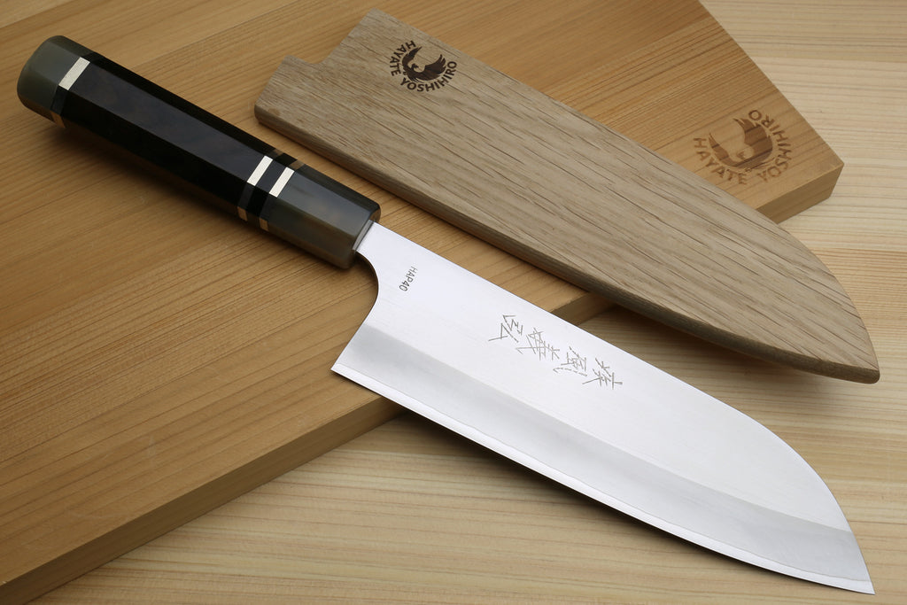 Santoku chef knife with ebony octagonal handle, HAP40 blade, and wooden saya