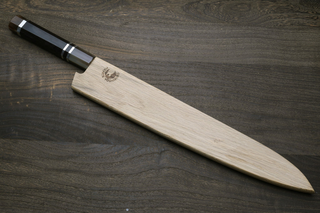 Sujihiki slicer knife with dark ebony triple-ring handle, polished blade, wood saya