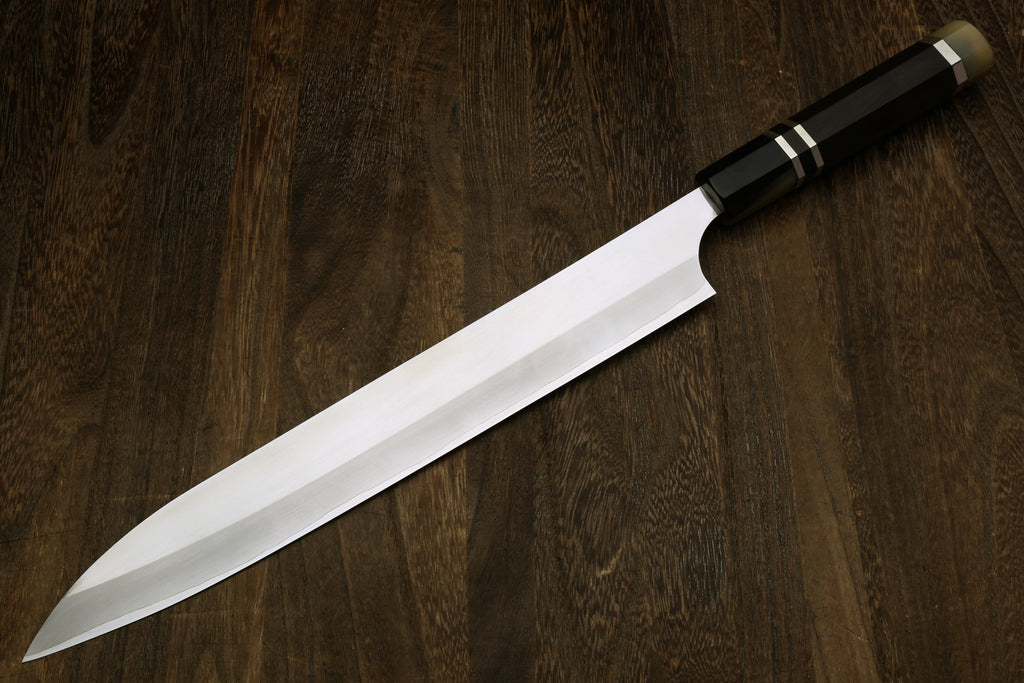 HAP40 sujihiki slicer with dark ebony triple-ring handle and white blade, angled