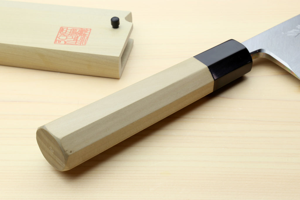 Japanese chef knife handle, light magnolia wood with black bolster and silver blade edge