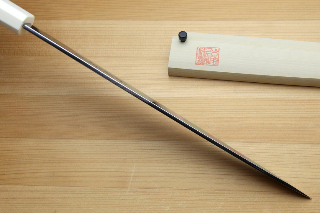 Left-handed Japanese yanagi knife with long straight blade and pale ivory handle