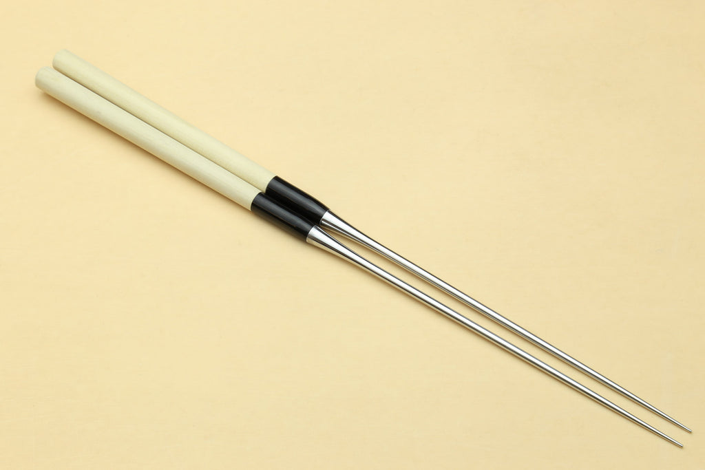 Single sushi plating tweezers with light wooden handle, black band, stainless tips