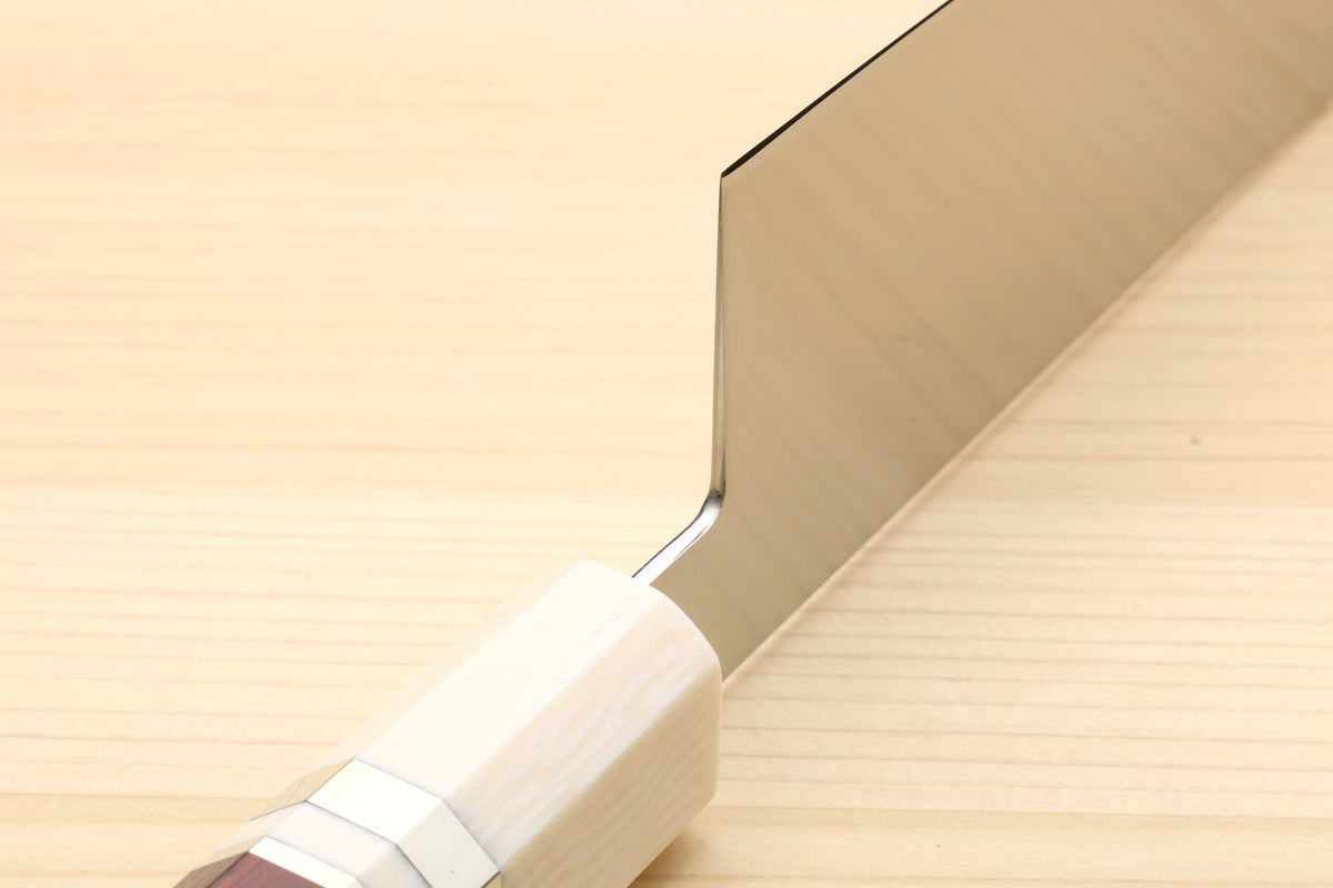 Kiritsuke chef knife spine detail with smooth white bolster and rosewood handle.