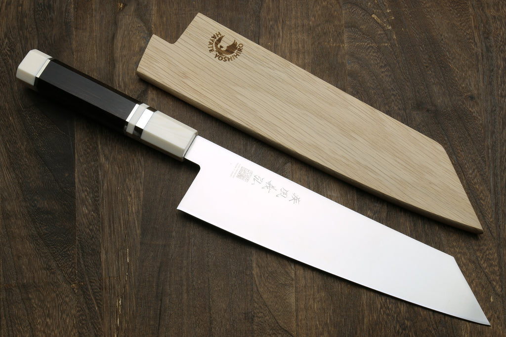 Kiritsuke chef knife with sheath, stainless blade, ebony handle and ivory accents.