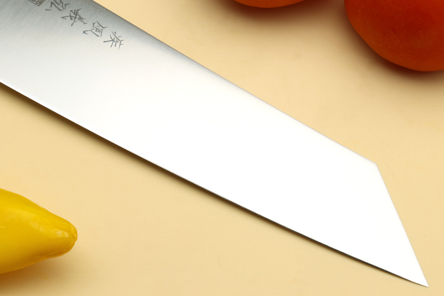 Kiritsuke chef knife blade tip, stainless steel edge