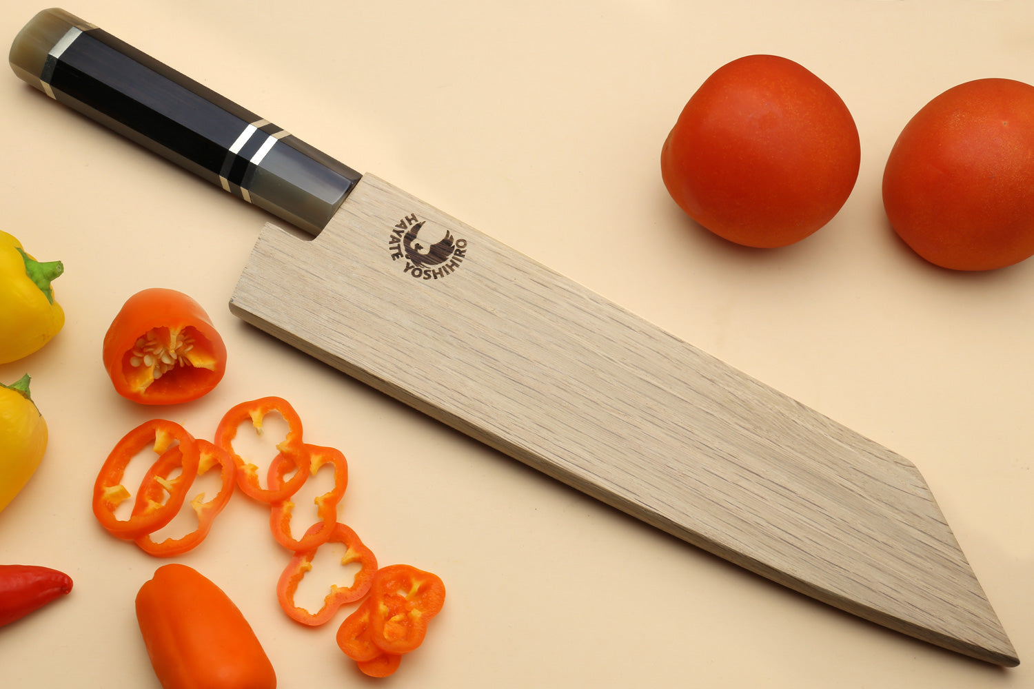 Yoshihiro kiritsuke chef knife with ebony handle and long tapered blade