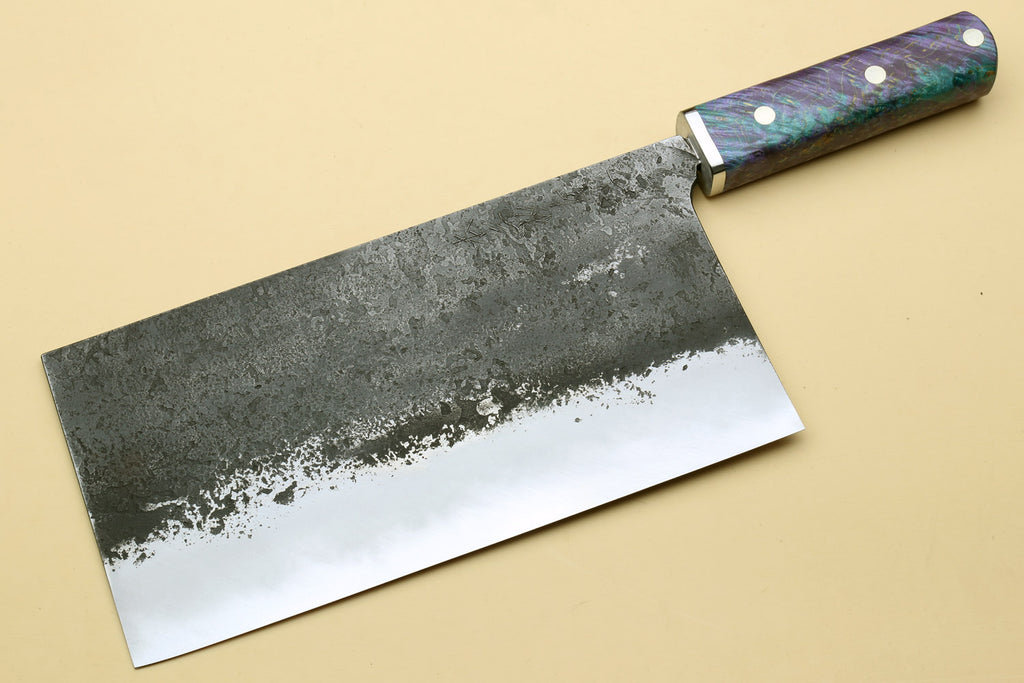 Chinese-style cleaver knife, wide dark mottled blade with iridescent purple-blue handle