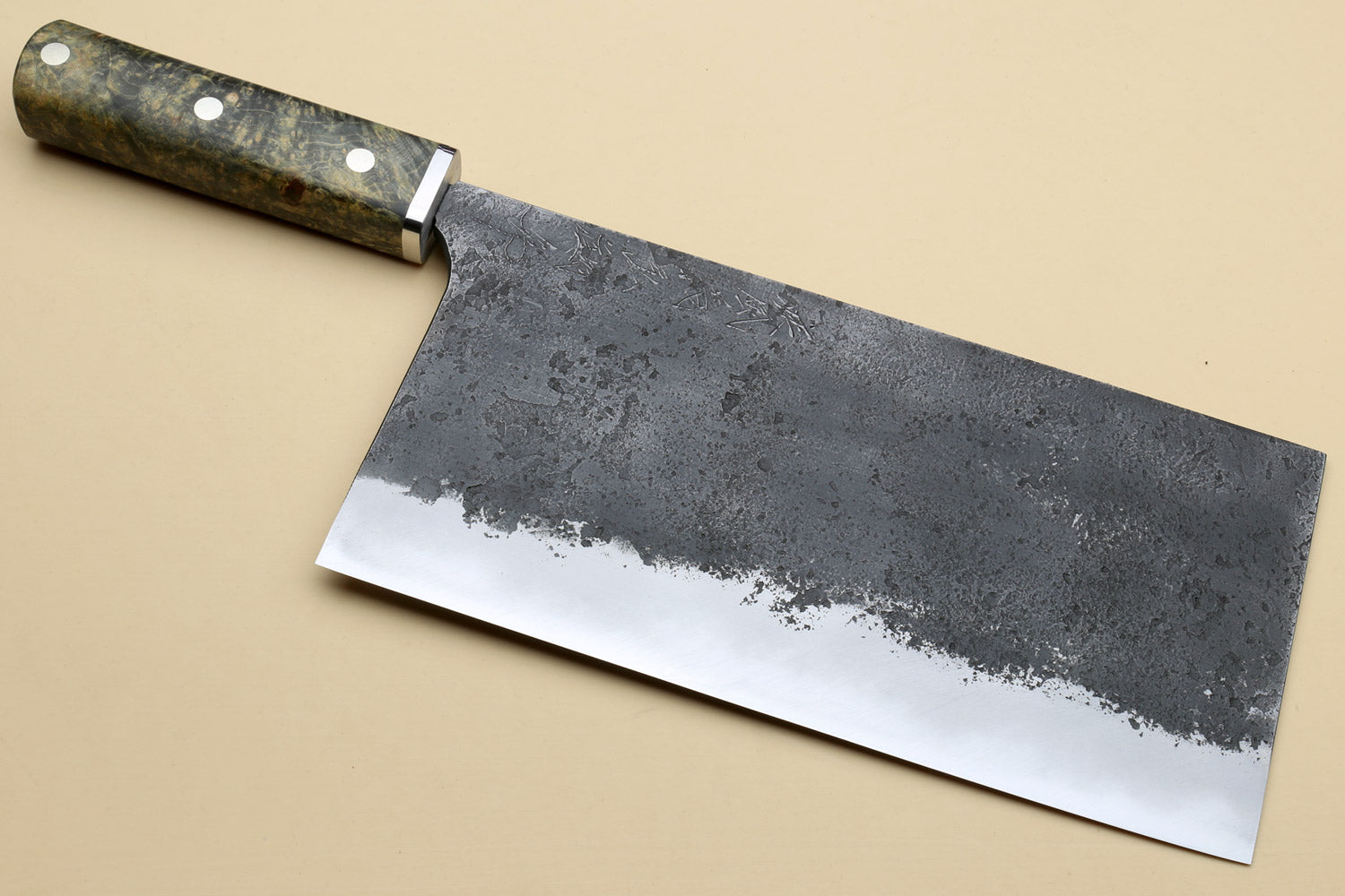 Chinese-style cleaver knife with dark burl-style wood handle and silver steel blade