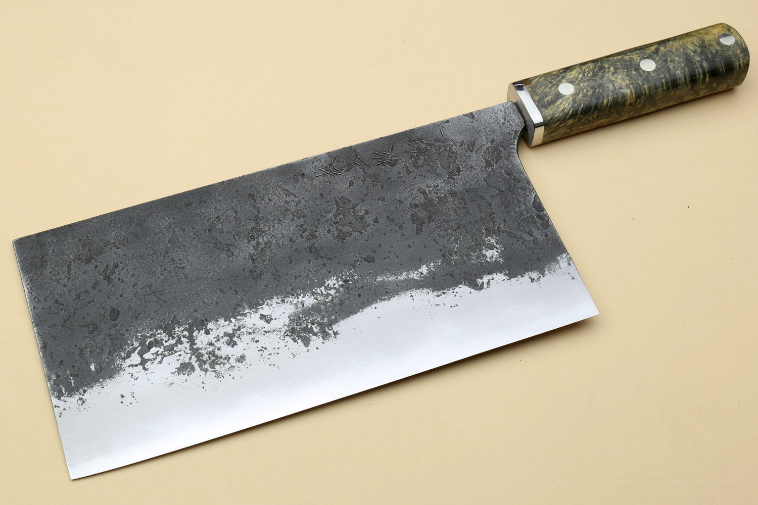 Chinese-style cleaver knife showing silver steel blade with speckled finish
