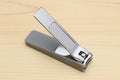 Silver-colored Japanese nail clippers with gray protective case