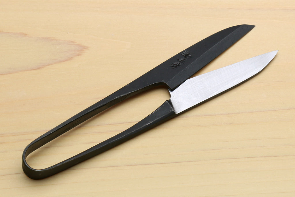 Japanese sewing snip scissors with black handle and silver blade