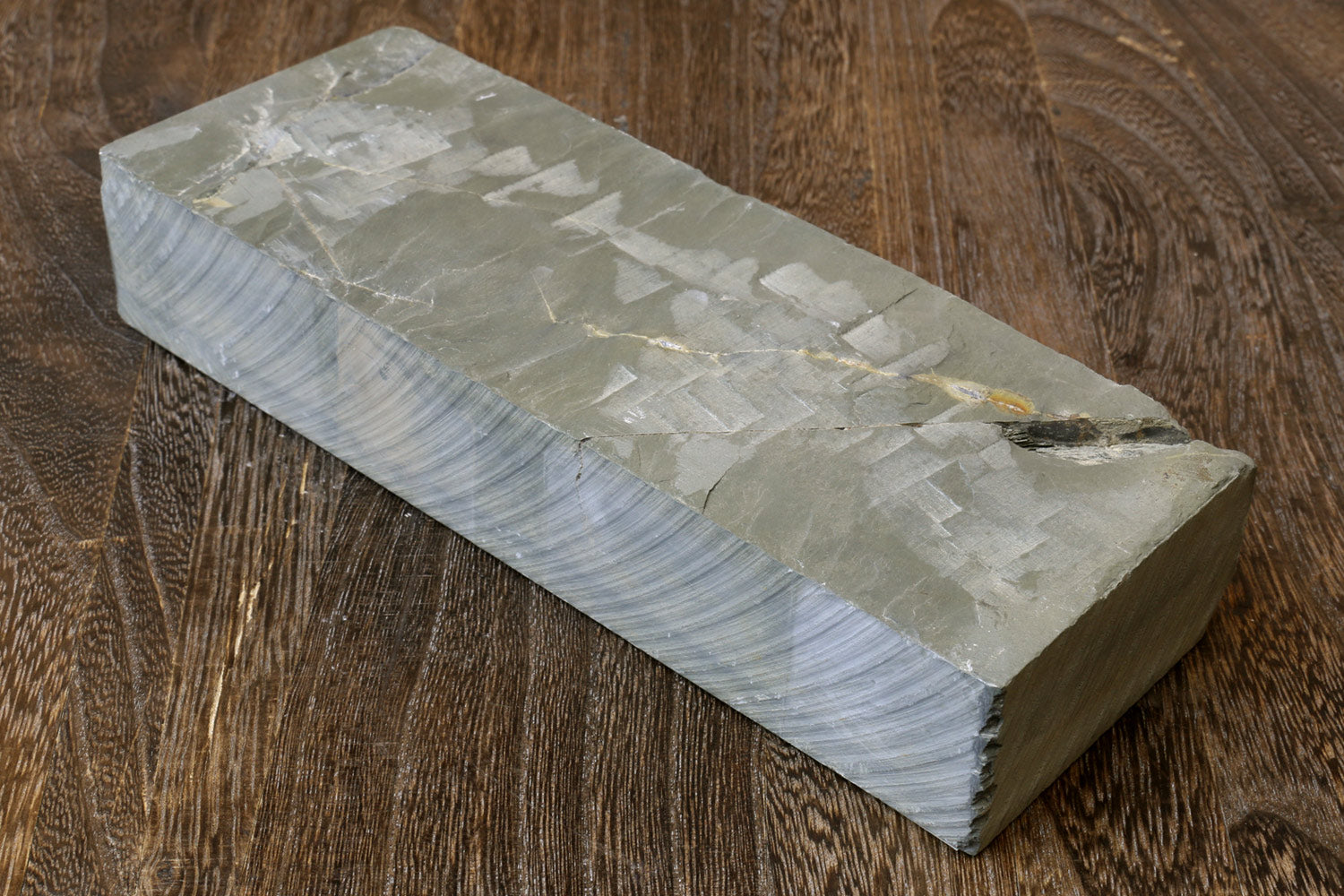 Rectangular gray natural whetstone sharpening stone, textured end and side
